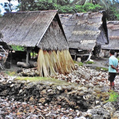 A row of salt workshops and saltwater soaking ponds in Alburquerque, Bohol, Philippines (photo taken in 2000). Photo: Andrea Yankowski