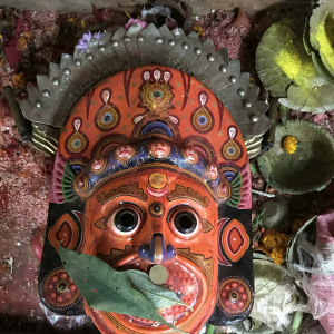Mask and crown of Duma, one of the Guardians of Bhairava, on display for devotees at a local festival. Madhyapur Thimi, Nepal. (Photo: Renuka Gurung)