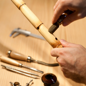Bilgin carving the tone holes on the reed’s body (Photo: Salih Bilgin)