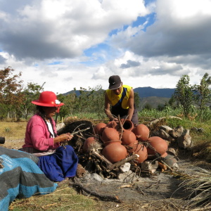 Pascual and Margarita Matailo preparing to fire pots, Cashapugro, Azuay, Ecuador