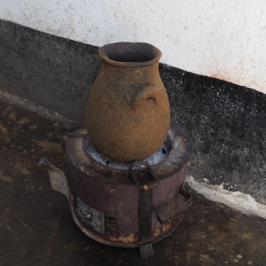 A finished cooking pot placed on a small charcoal stove (jiko). Photo: David Kay