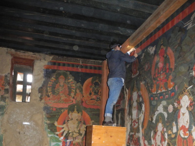 Ayesha Fuentes recording the condition of mural paintings at Tango Monastery, Bhutan, October 2014 (Photo: Utsha Gurun)