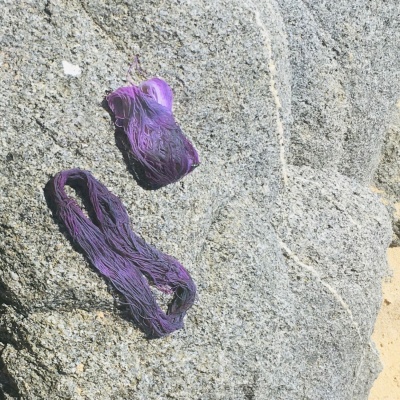 Cotton threads dyed with purple. (Photo: Camilla Fratini)