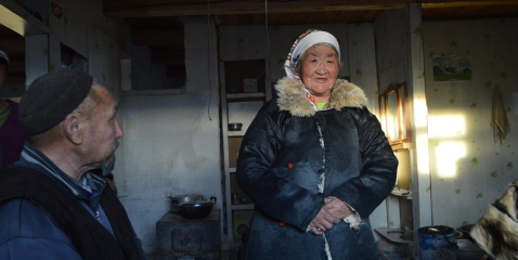 A woman models the sheepskin coat given to her by her mother-in-law. Photo: Kristen Pearson