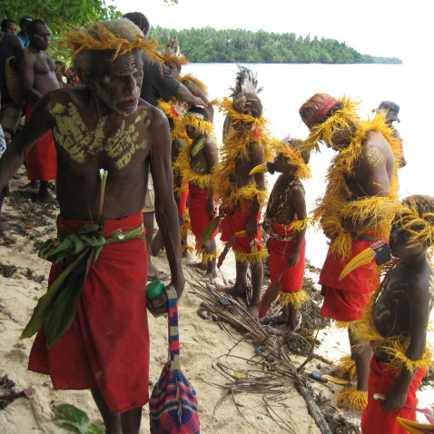 Young dancers preparing to perform at mortuary ceremony, New Ireland. Photo: Graeme Were