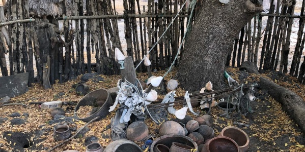 Traditional shrine at the village of Bulol (Djola-Felupe land, northern Guinea-Bissau) featuring ceramic vessels commonly used in traditional ceremonies (Photo: Angelo Vasco)
