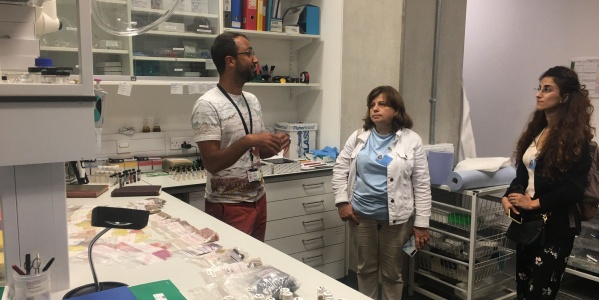 Diego Tamburini of the British Museum's Scientific Research Department speaking with EMKP Grantees Renas Babakir and Romana Motyl (Photo: Paula Granados Garcia)