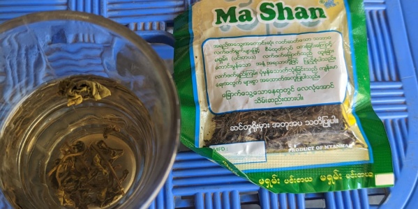 A tea from Myanmar in a tea stall of camp, Ukhiya, Kutupalong, Cox’s Bazar, 2023 (Photo: Tahura Enam Navile)